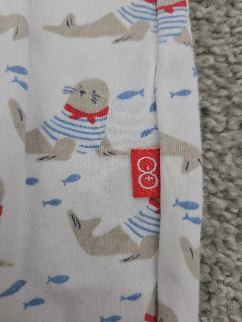 Magnetic Me White Seal Print Footed One-Piece with Navy Trim